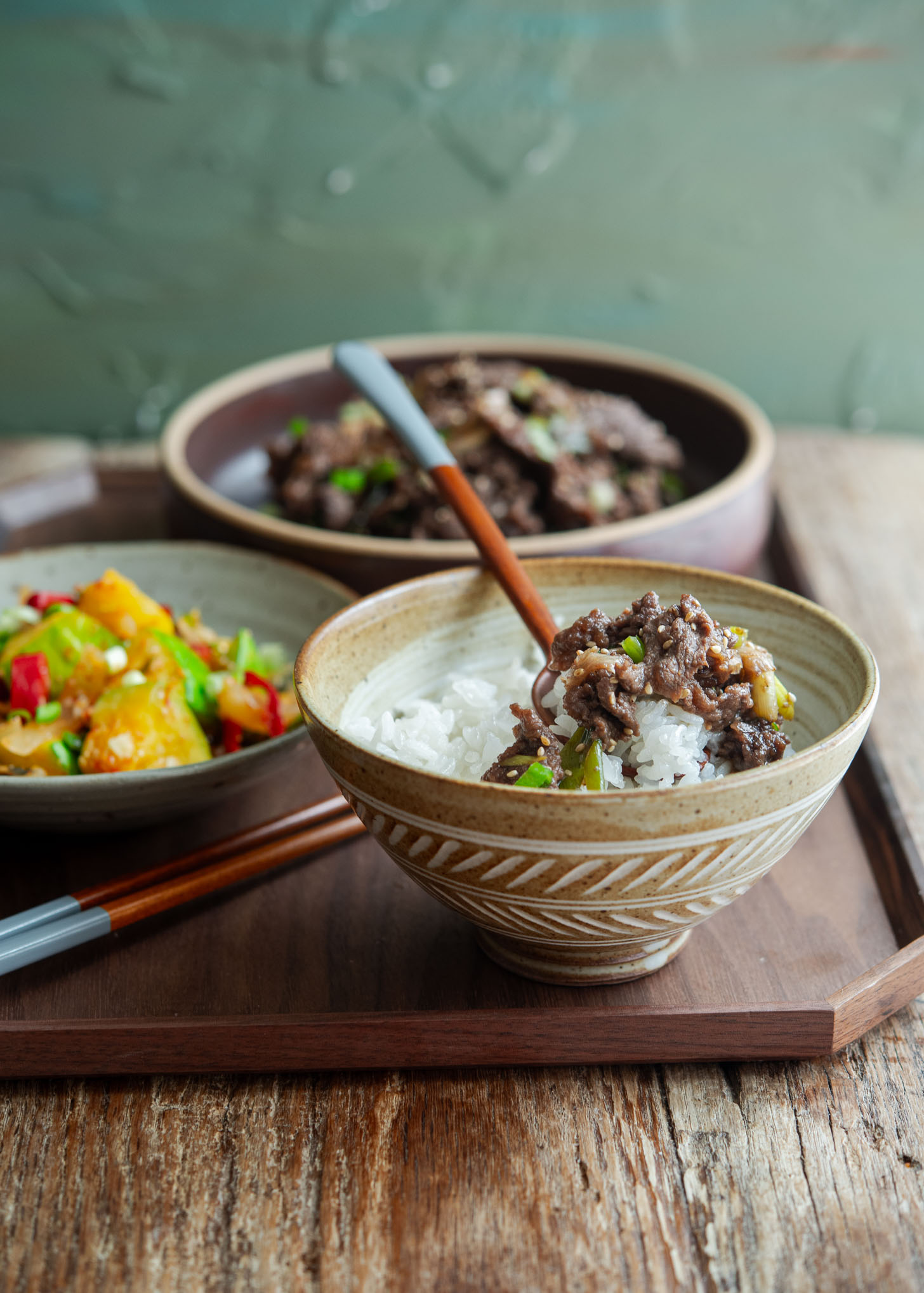 Bulgogi (Korean BBQ beef) served in classic Korean way with rice and side dish.