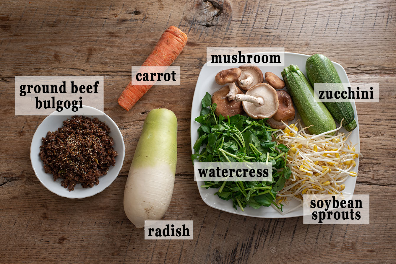 Various Koran vegetables and ground beef bulgogi for making bibimbap recipe.
