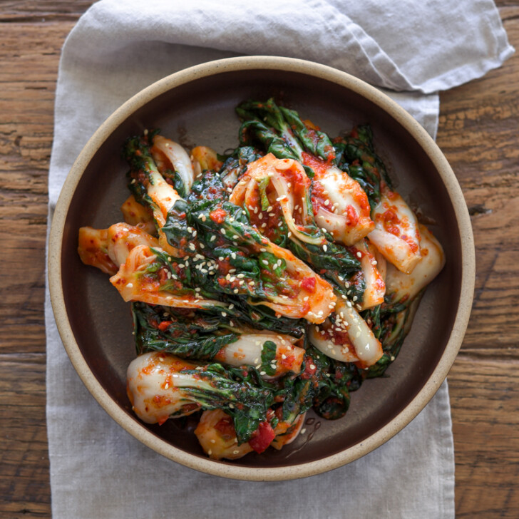 Freshly made Bok Choy Kimchi is served in a stone bowl