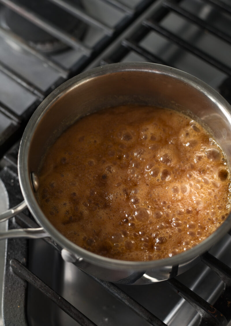 Boil butter, cream and brown sugar to make caramel toping
