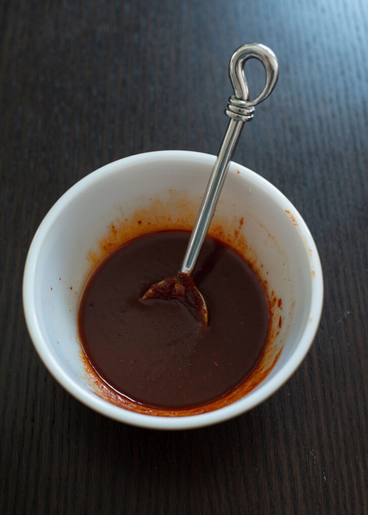Bibim sauce ingredients mixed in a bowl.