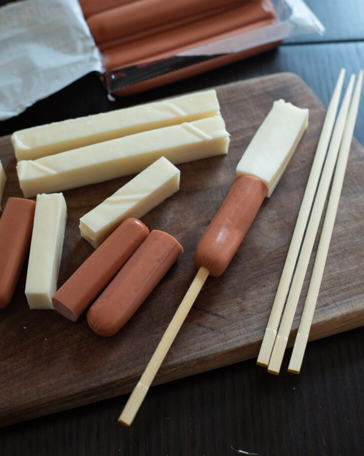 Korean cheese hotdogs on skewers.