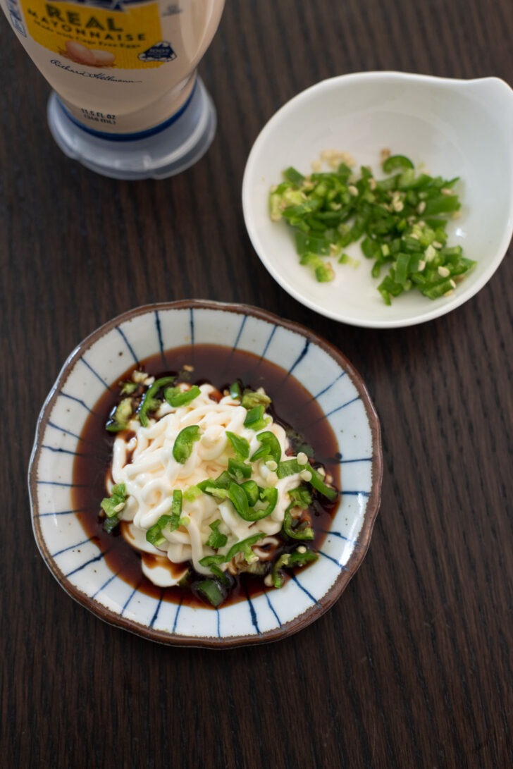 soy sauce, mayonnaise, chopped green chili are combined as a dipping sauce.