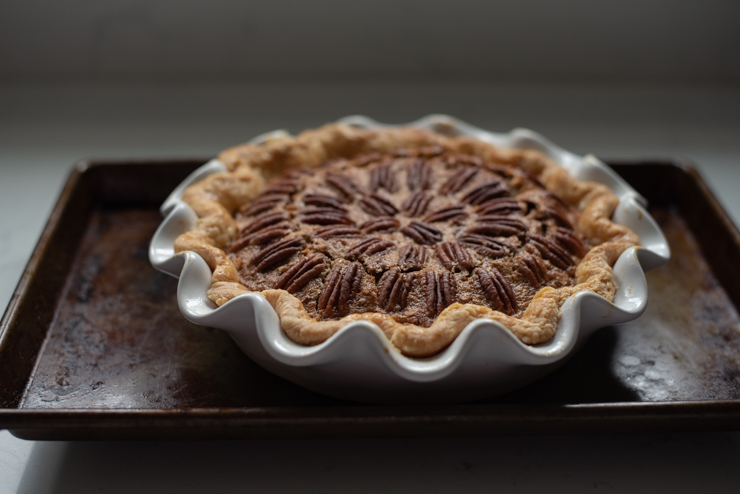 Perfectly baked pecan pie is nicely browned on top.