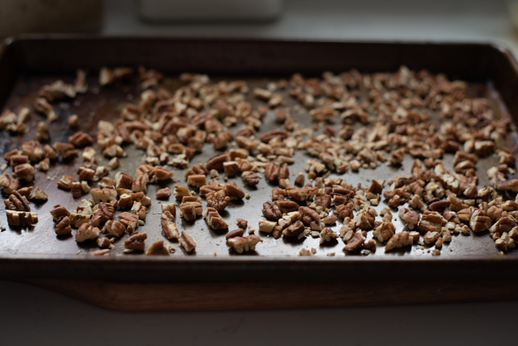 Toast chopped pecan pieces to get nutty flavor for pecan pie.