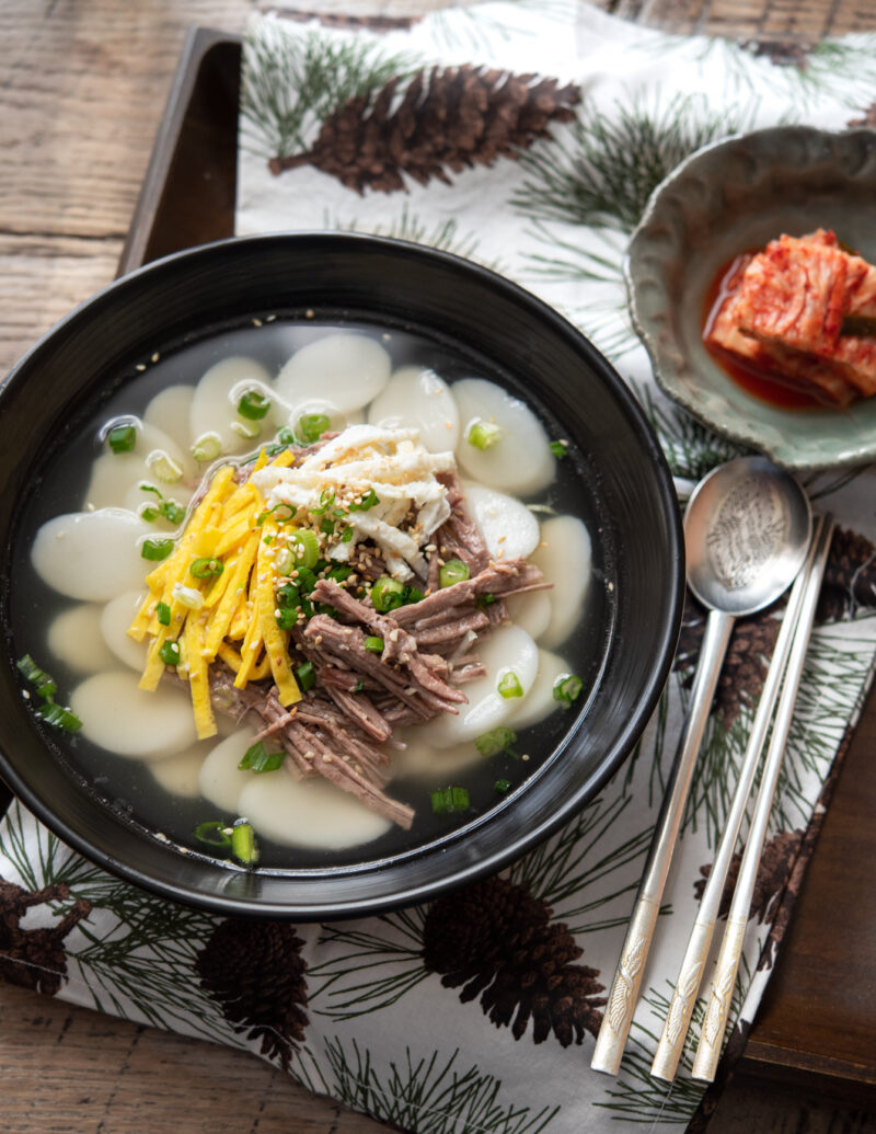 Rice cake soup topped with egg garnish is a traditional Korean New Year's day food