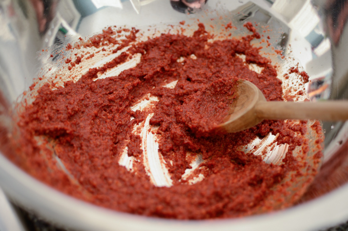 Kimchi seasoning paste is made in a large bowl.